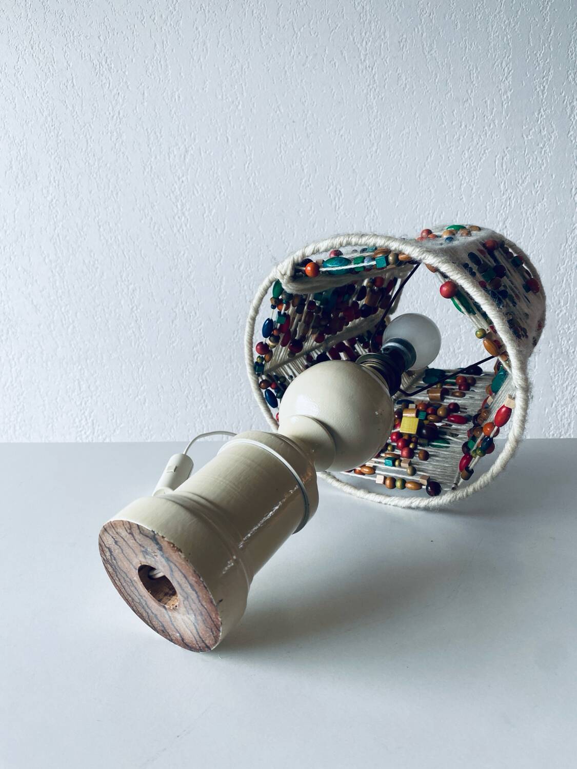 Lamp in turned wood and beads