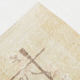 Faded beige classic vintage rug