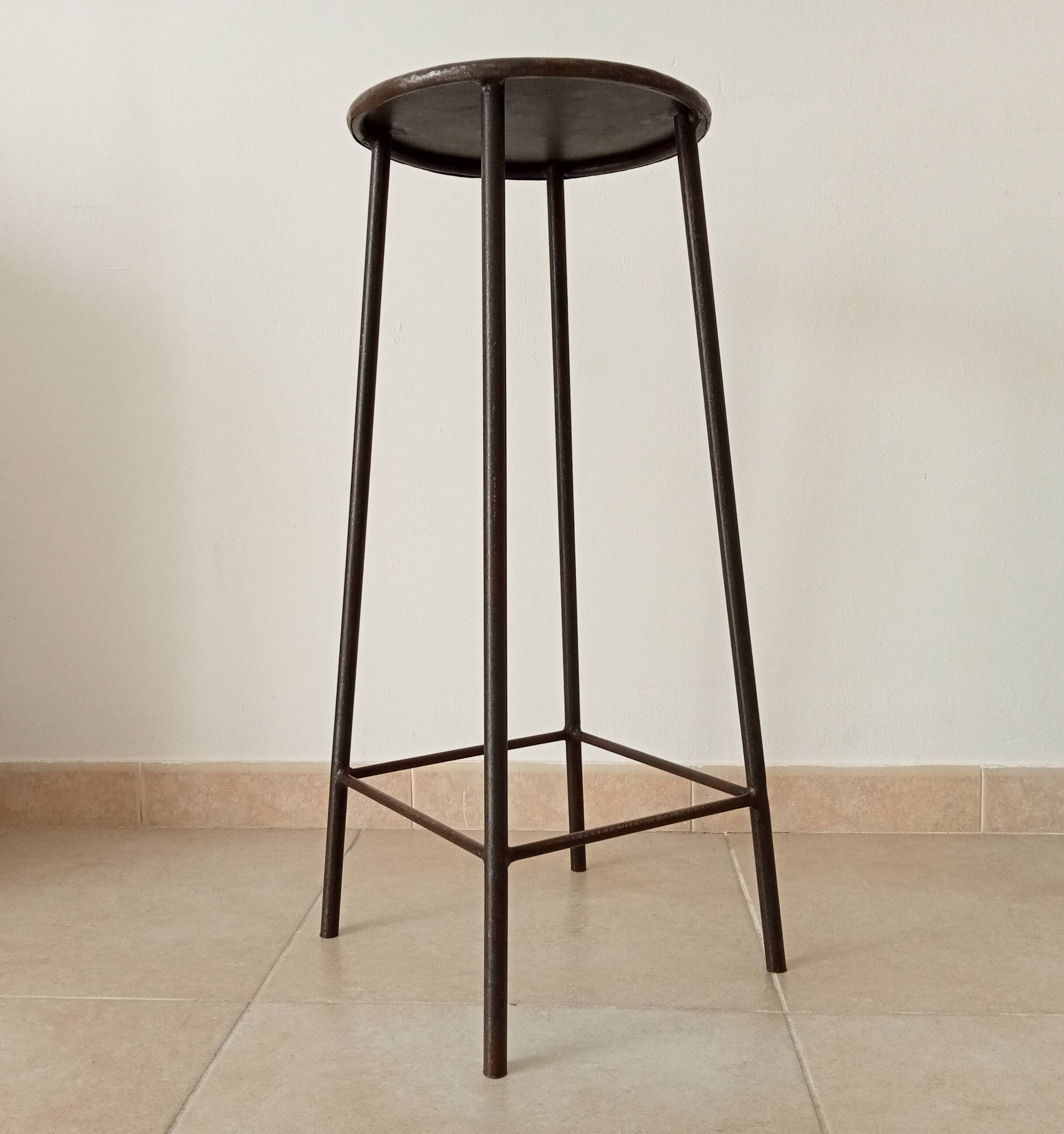 Brutalist high stool from the 1960s in solid steel.