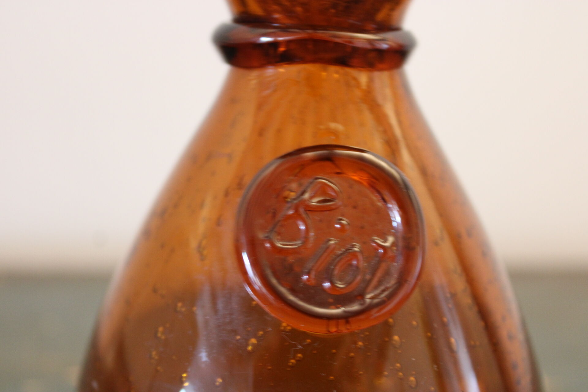 Biot decanter in blown glass bubbled orange hue