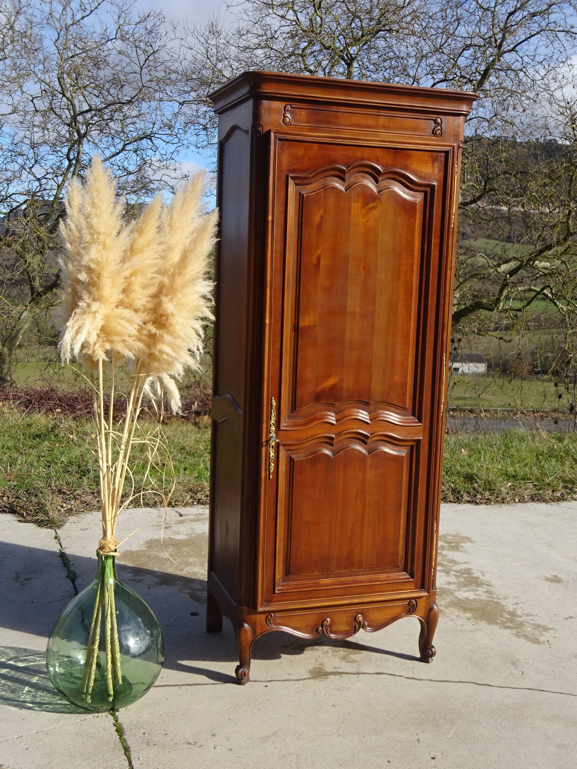 Louis XV style bonnetière in solid cherry wood