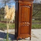 Louis XV style bonnetière in solid cherry wood