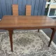 Rectangular extendable table in Scandinavian style made of teak.