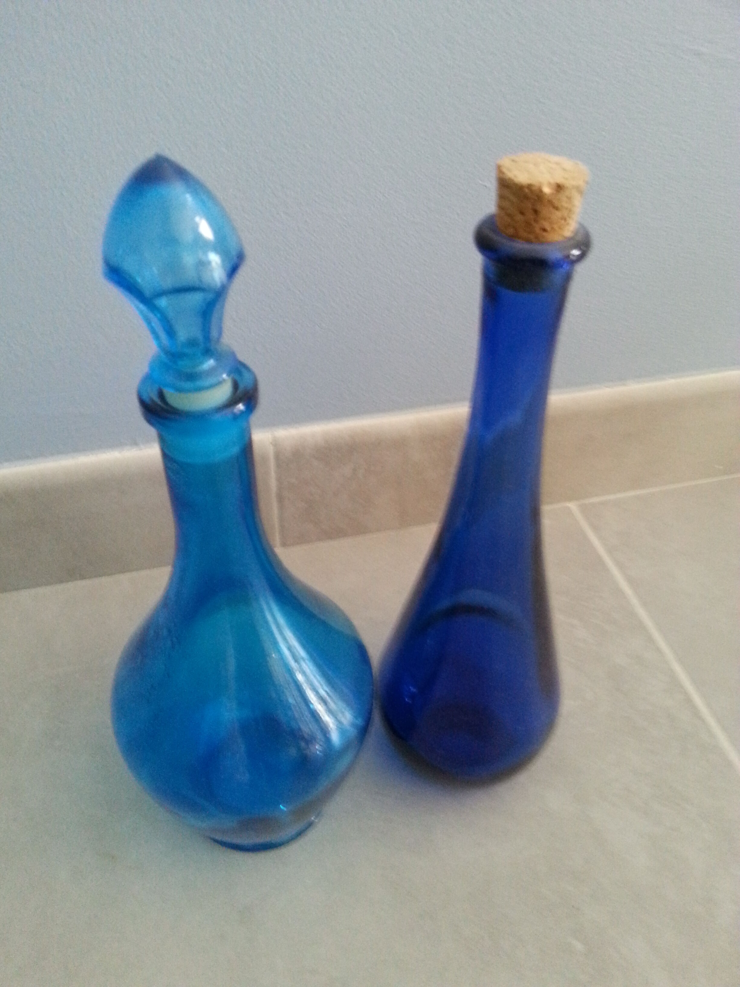 Lot 2 blue glass bottles