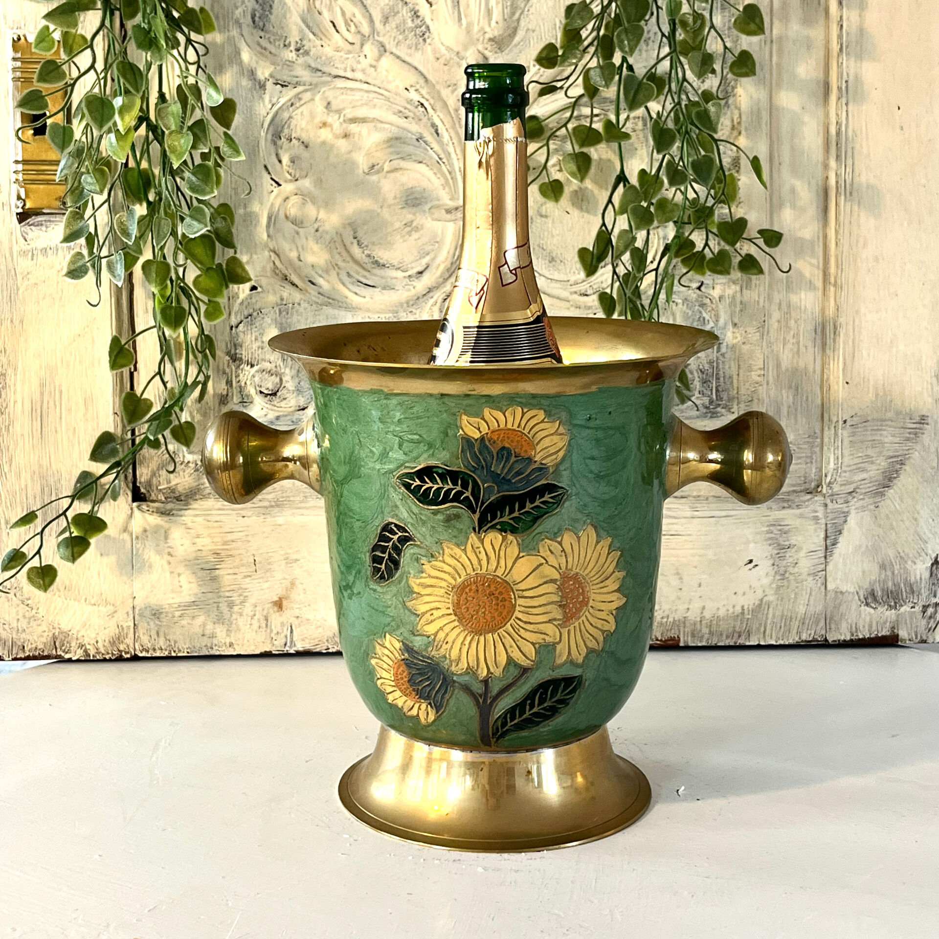 Vintage brass and green enamel cloisonné champagne cooler with sunflow