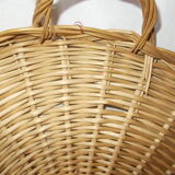 Round wicker dish with handles