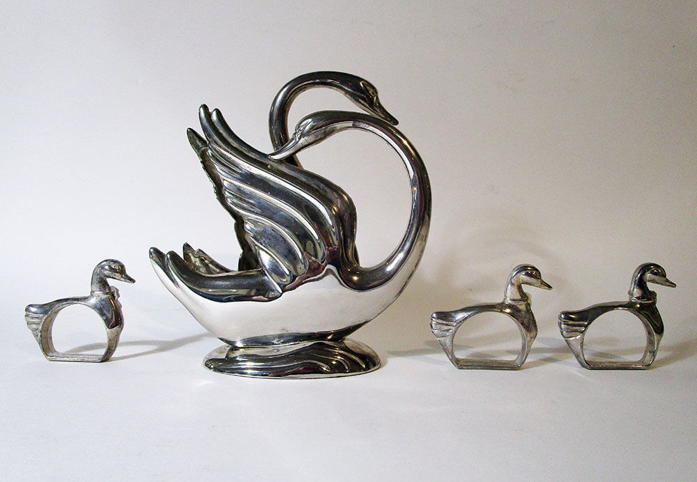 Paper towel holder with swans