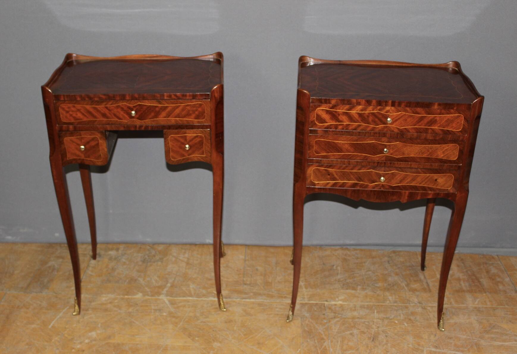 Pair of Louis XV style bedside tables in marquetry, 20th century.