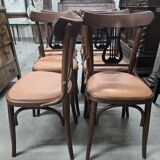 Set of 6 vintage curved wooden chairs, adorned with an elegant black lyre-shaped backrest.