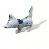 Little ceramic cat playing with a playful ladybug plays gray and white decoration