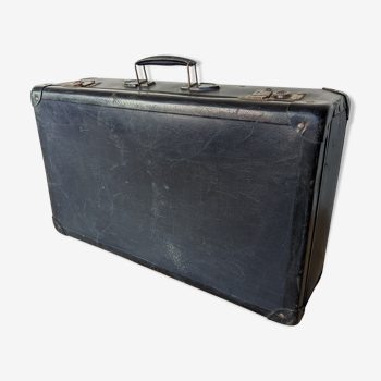 Old vintage navy blue suitcase