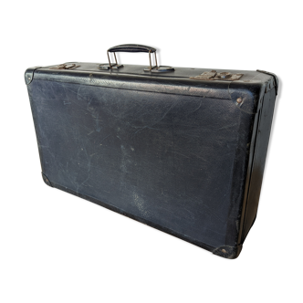 Old vintage navy blue suitcase