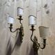 Pair of Louis XV style Rocaille wall sconces in bronze