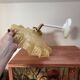 Vintage tilting wall light in gold Clichy glass