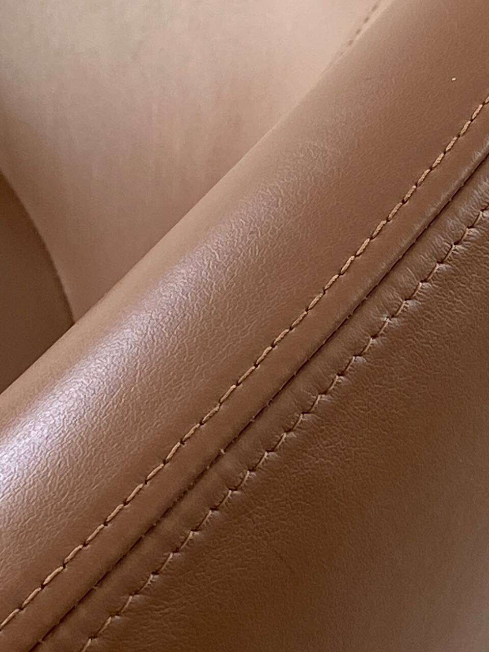 Set of 8 Italian design swivel chairs in cognac leather.
