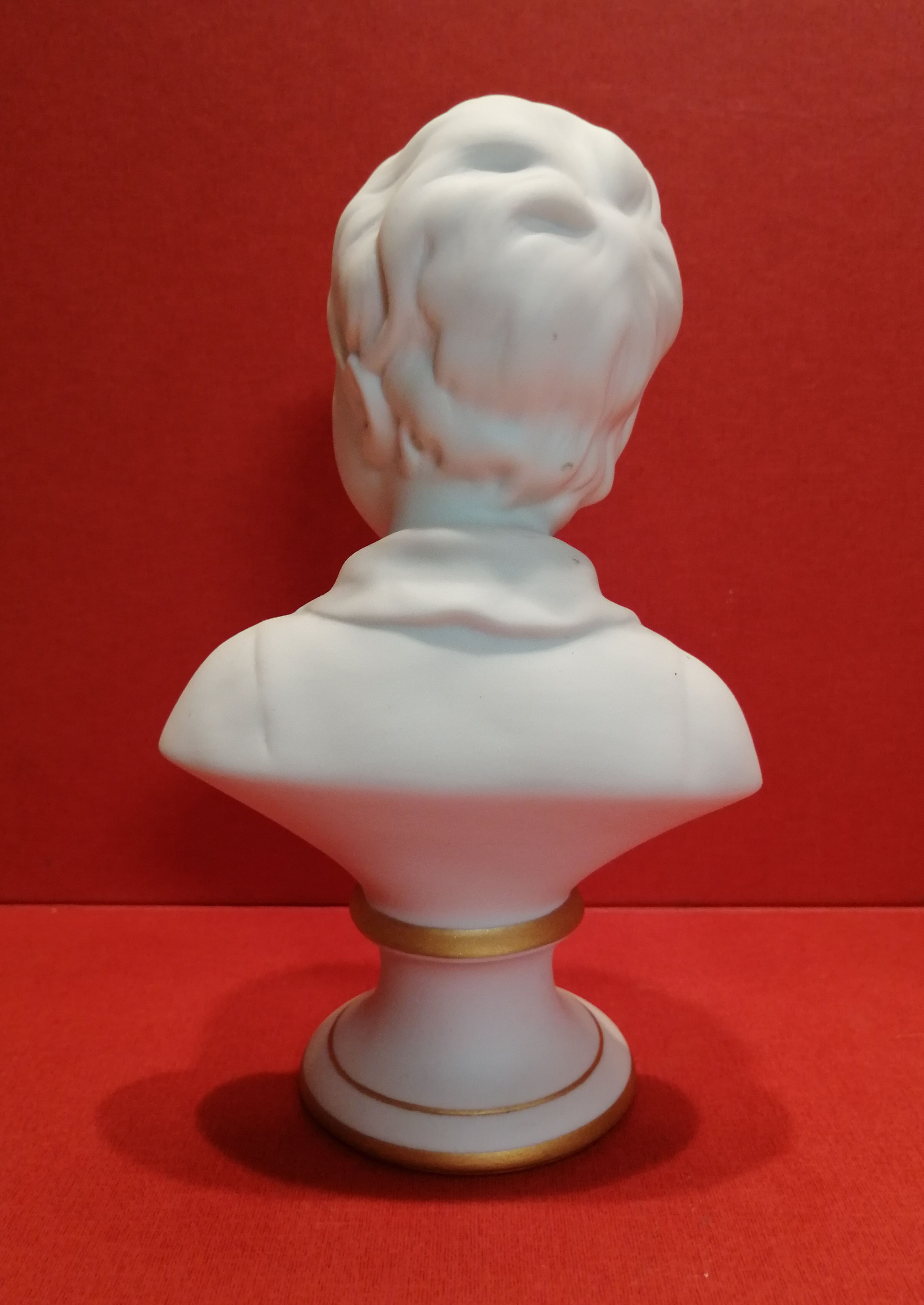 Small bust young boy in biscuit Tharaud Limoges