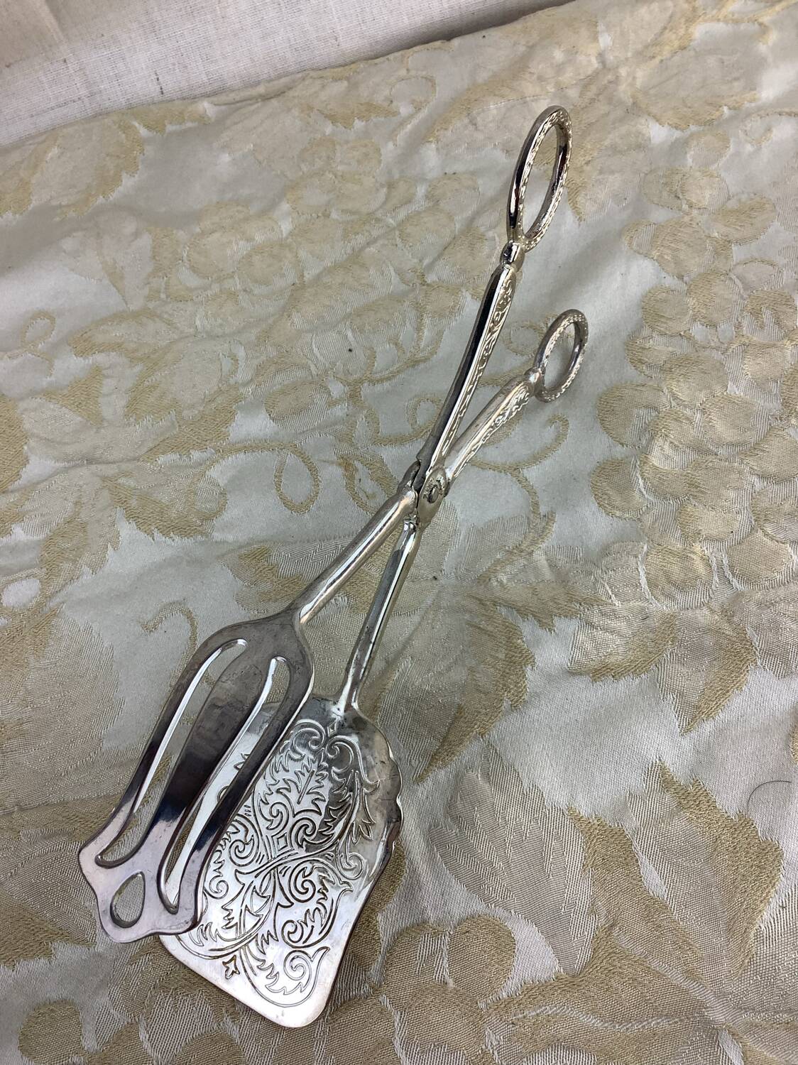 Old cutlery tongs