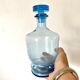 Carafe ancienne en verre bleu