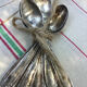 Nine small silver teaspoons