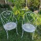 2 antique wrought iron armchairs