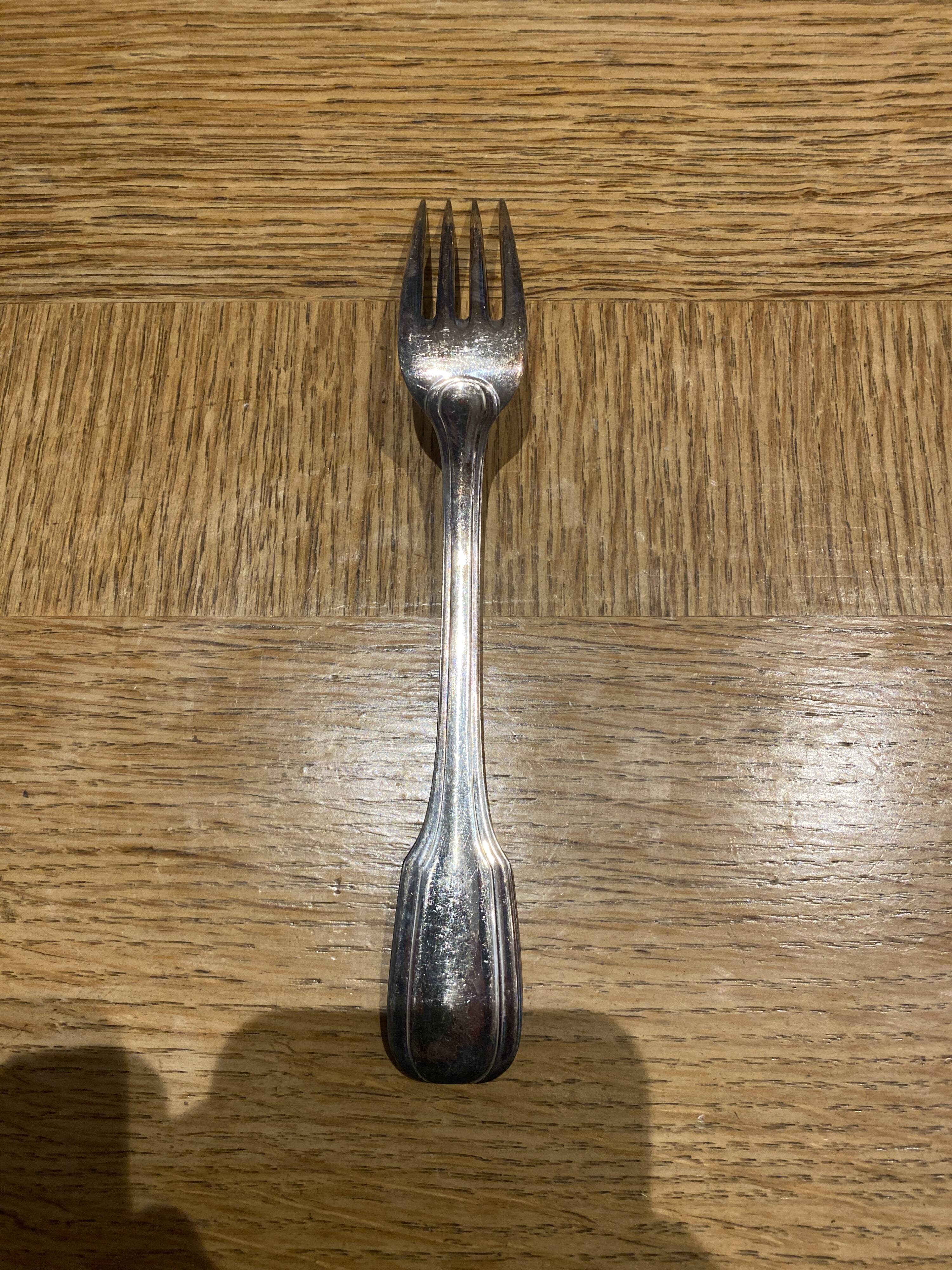 12 large silver metal forks