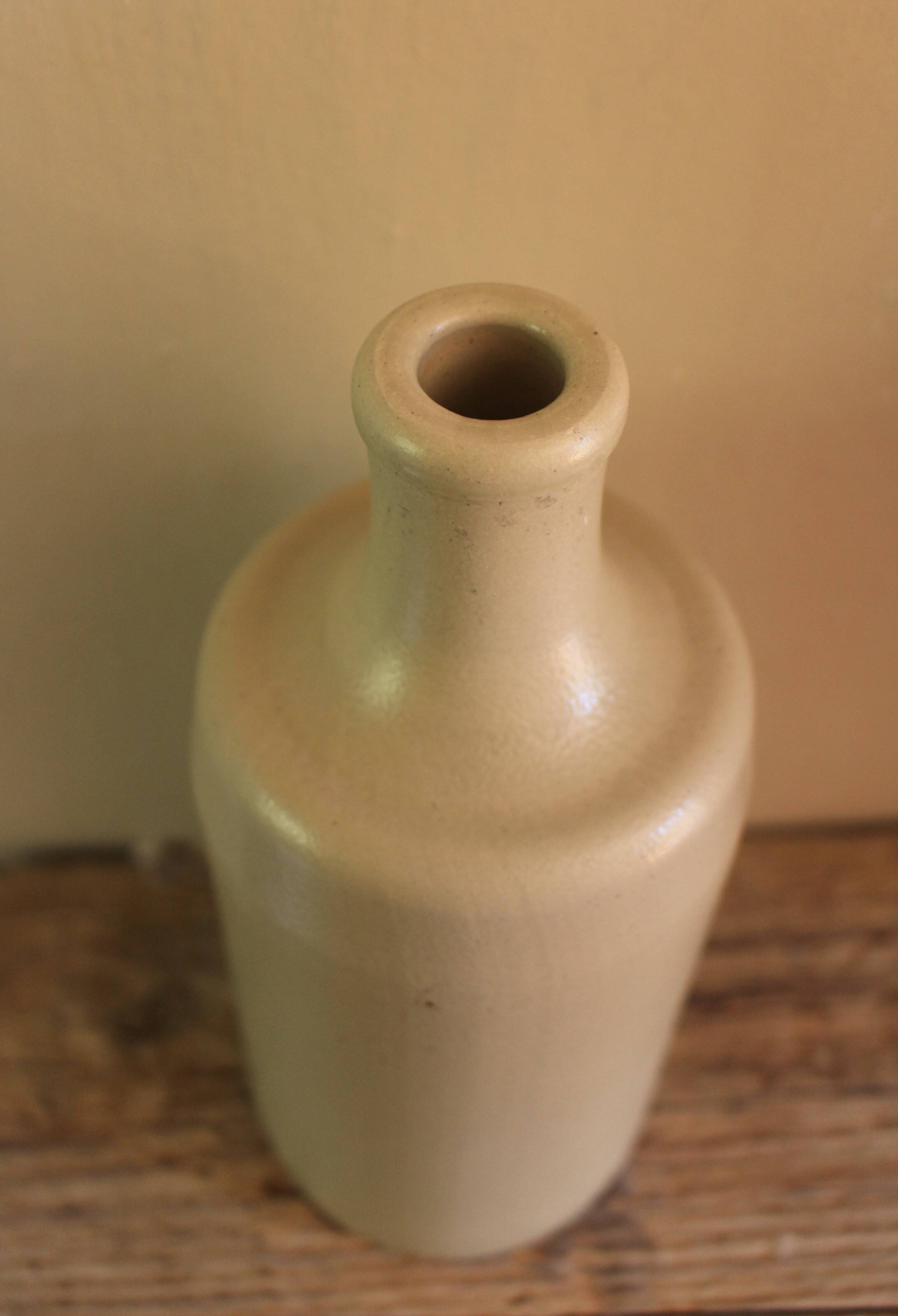 Vintage stoneware liqueur bottle