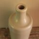 Vintage stoneware liqueur bottle