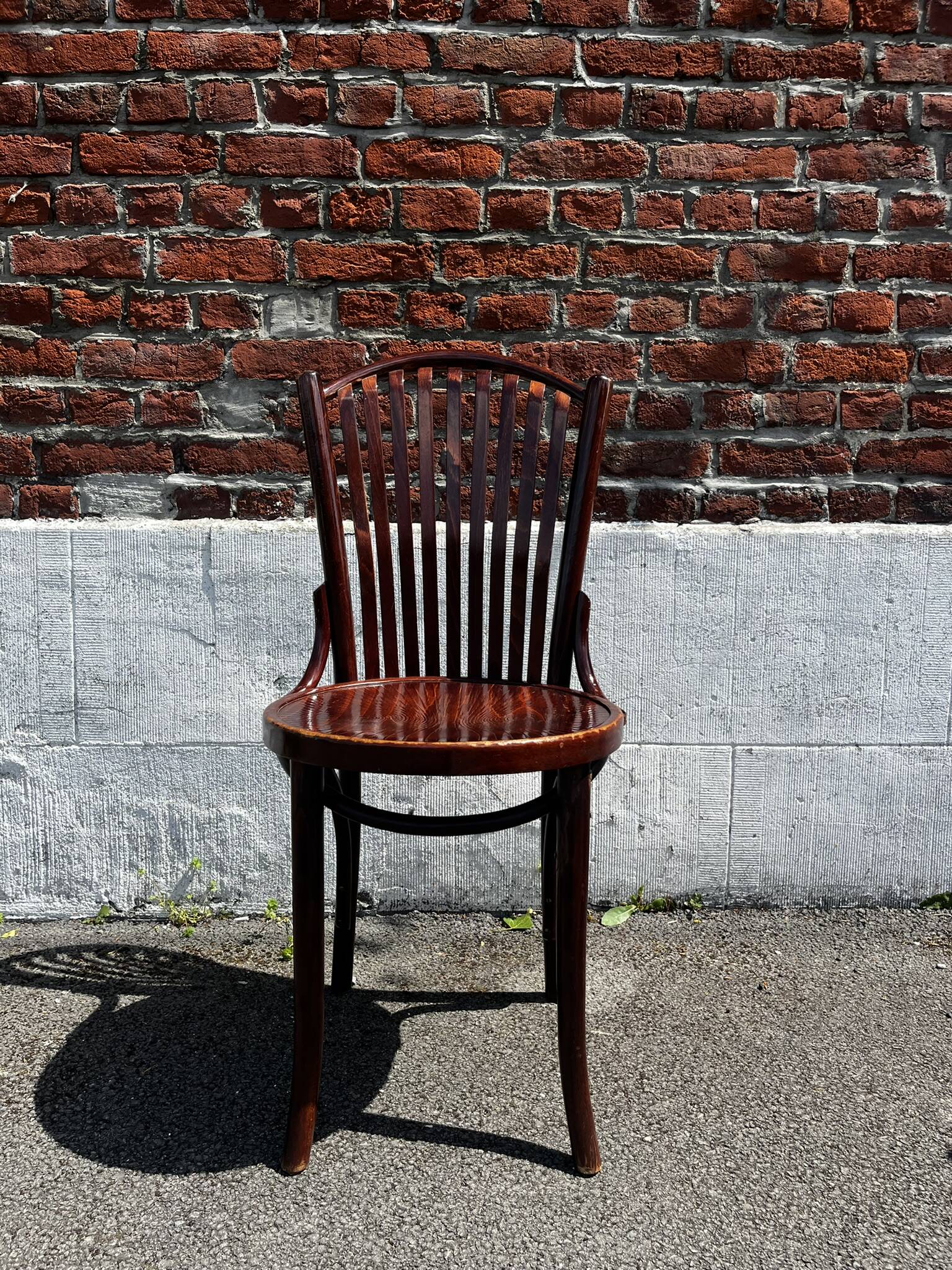 Lot of 4 vintage bistro chairs with slats in Thonet style.