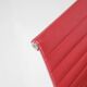 "EA 108" armchair in red leather, designed by Charles and Ray Eames for Vitra,