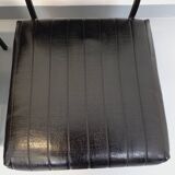 Set of 2 vintage modernist armchairs in black faux leather and metal.