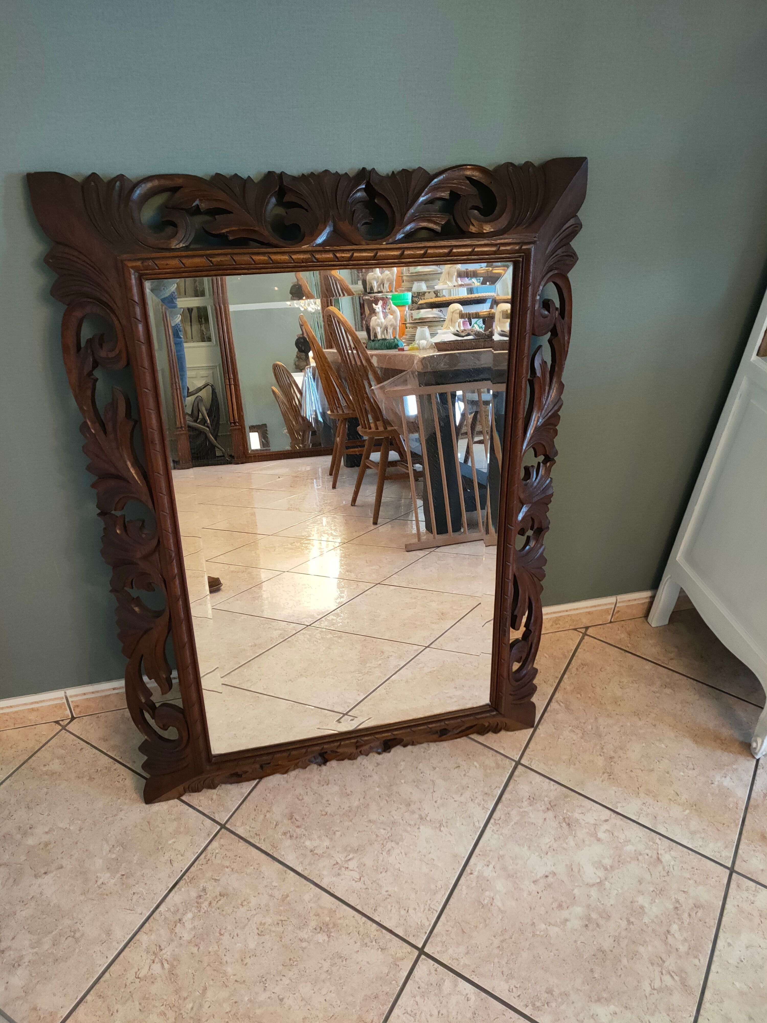 Antique mirror in openwork carved wood