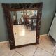 Antique mirror in openwork carved wood