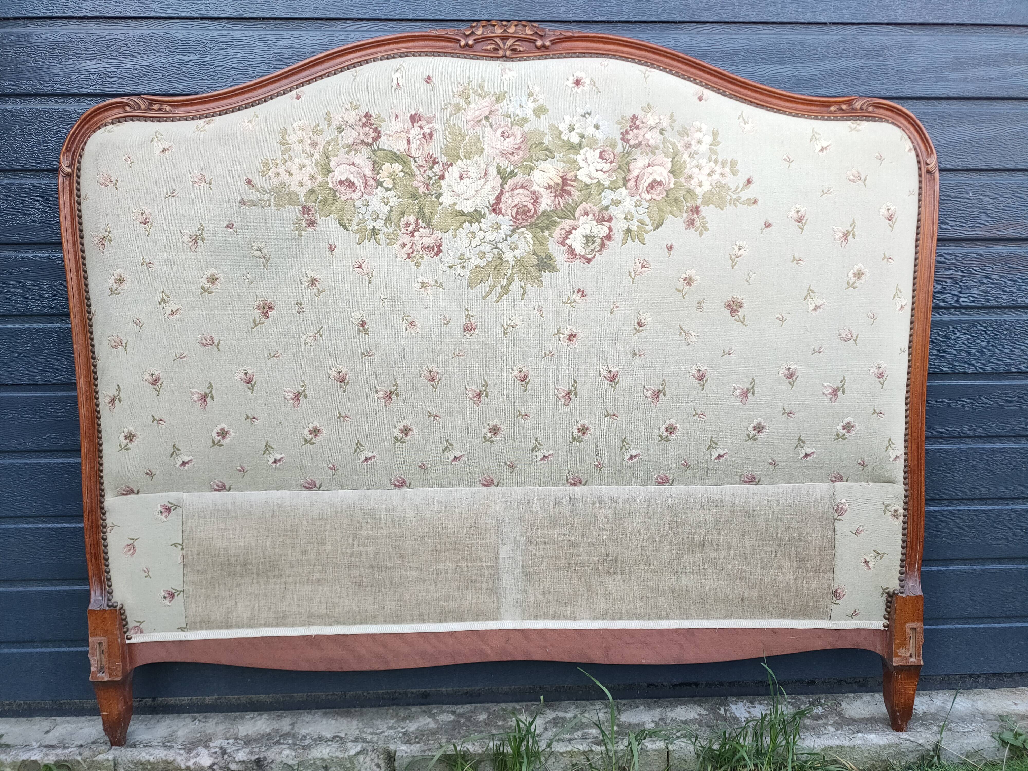 antique fabric and wood headboard