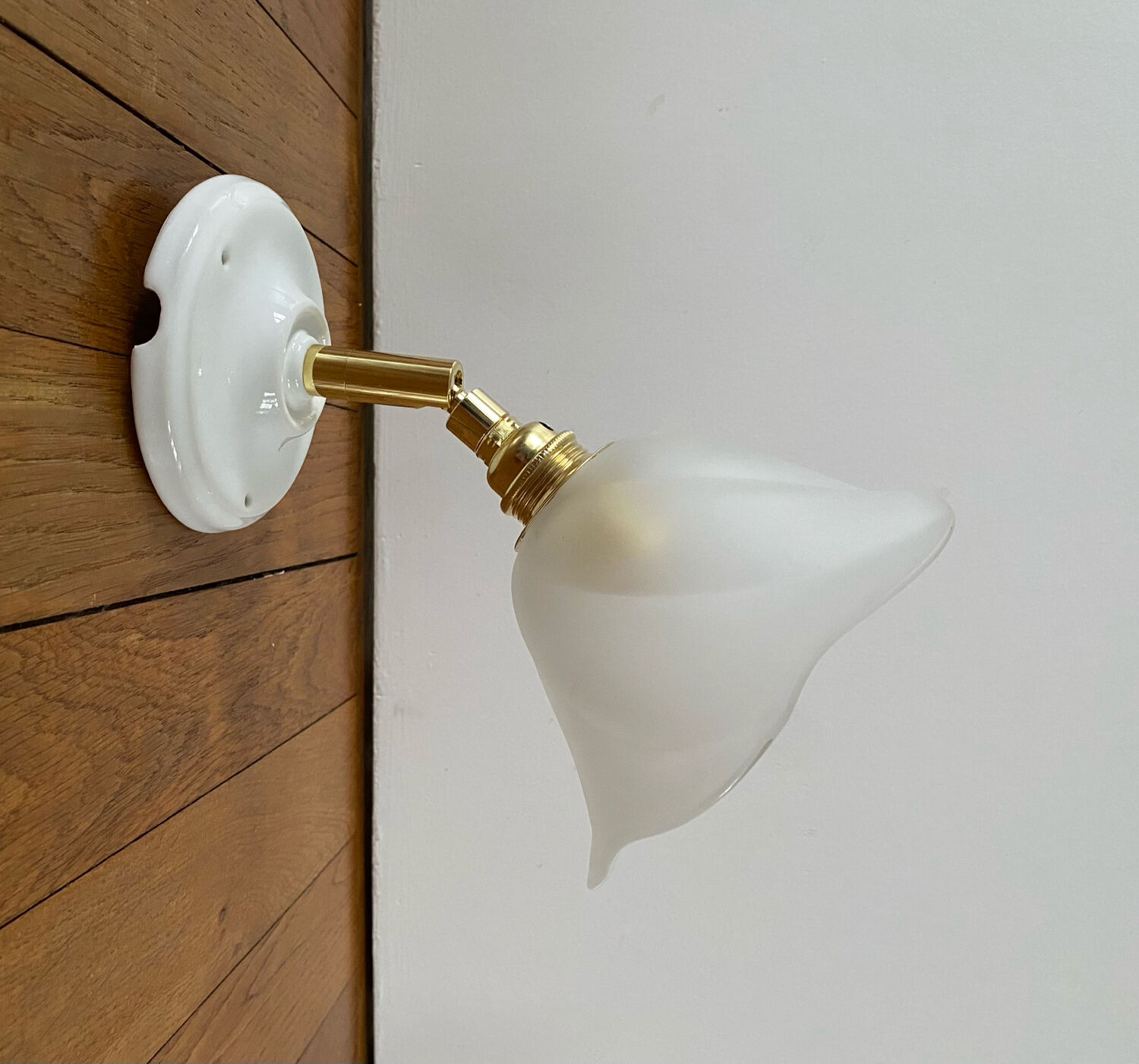 Pair of wall sconces with vintage globes