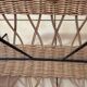 Wearing vintage rattan and black iron design magazines of the 1960s.