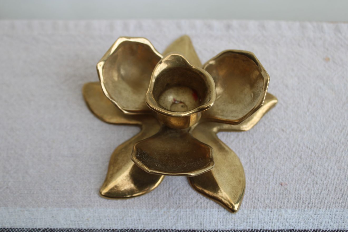 Golden brass candle holder