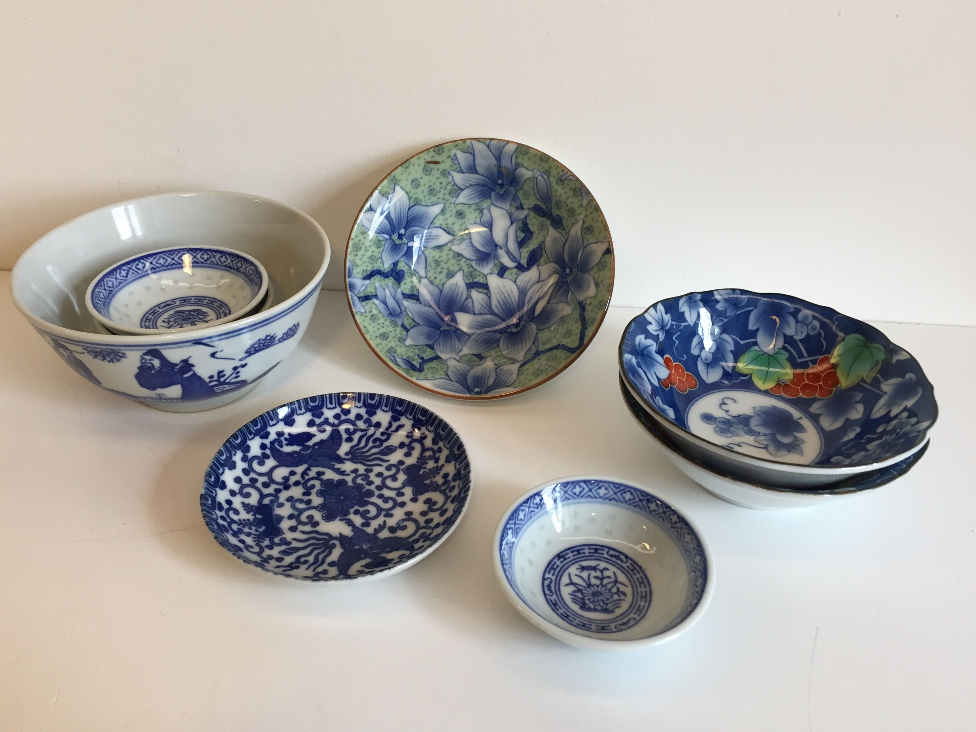 set of 4 bowls and 4 asian porcelain cups