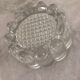 4 flat glass candle holders cut in the shape of Vintage flowers