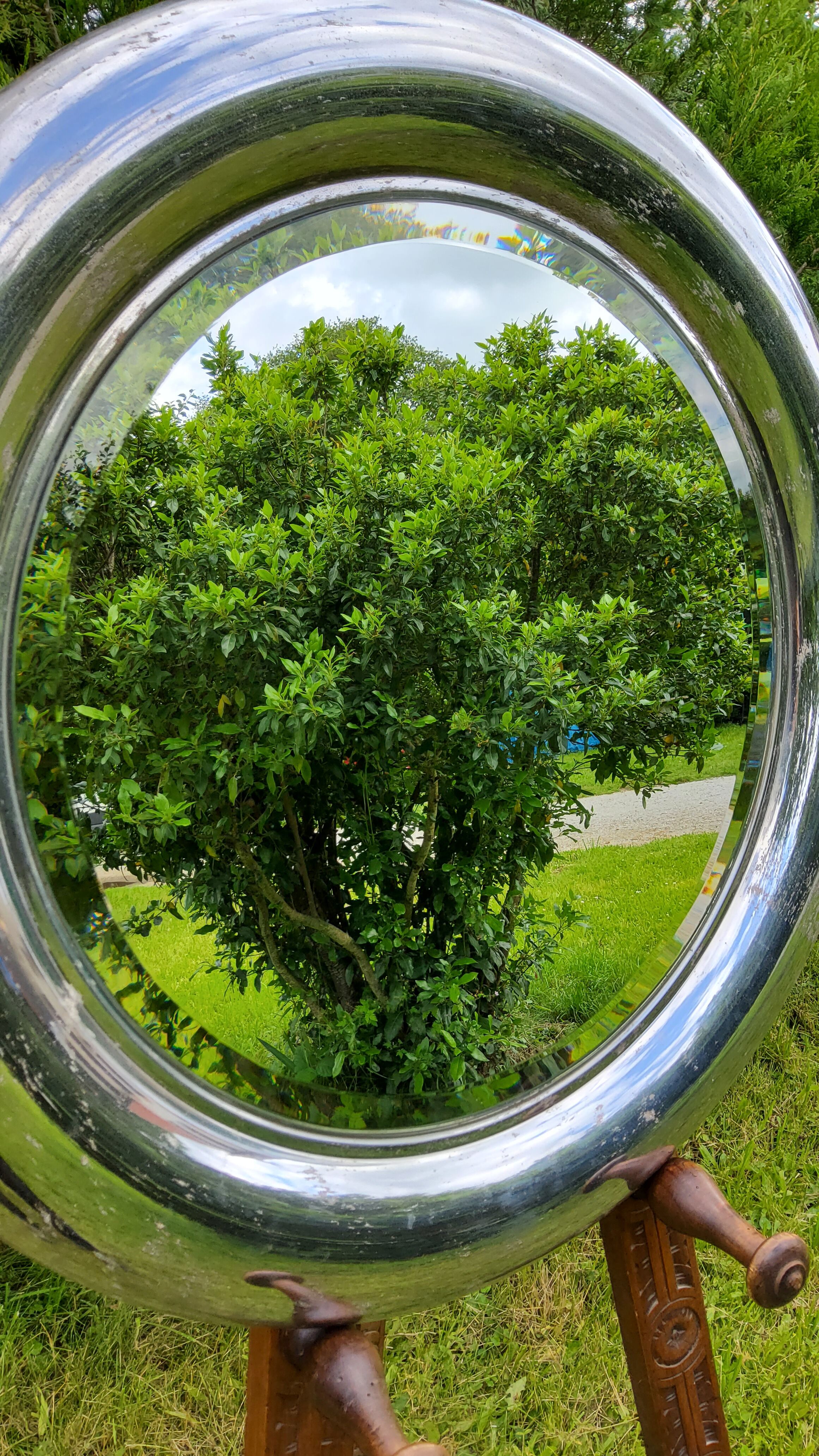 Round mirror of the 70s chromed by Reggiani Lampadari
