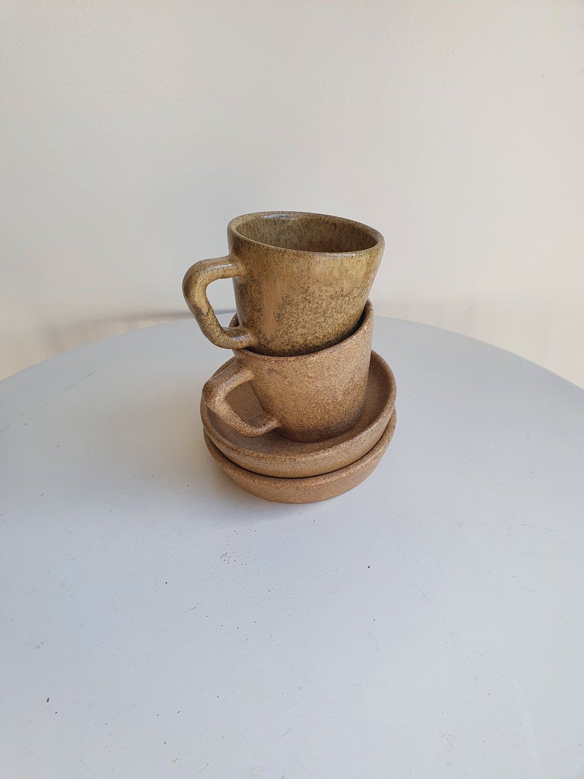 Lot of 2 cups and saucers in sandstone