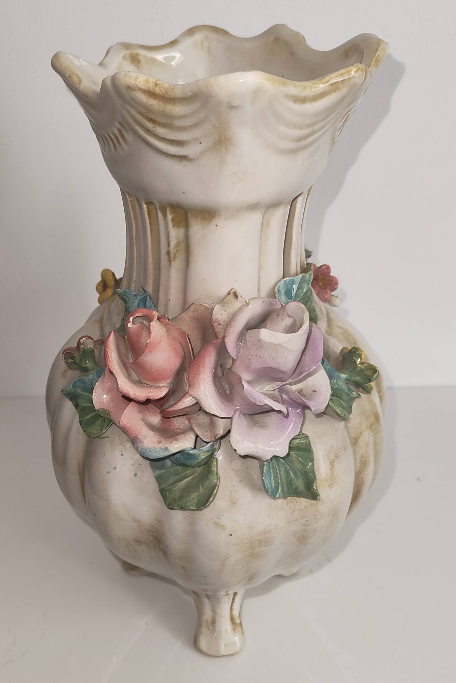 Antique ceramic pot-pourri vase with relief floral decoration.