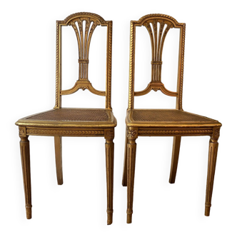 Pair of Louis XVI style fluted gilded chairs