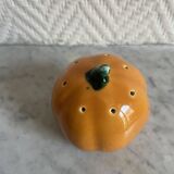 Set of ceramic salt and pepper shakers in the shape of a pumpkin tomato
