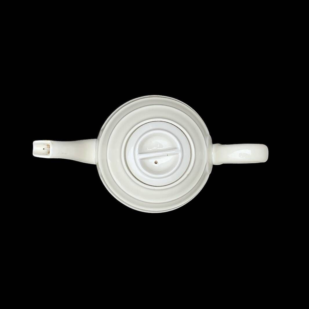 Wmf art deco teapot and matching milk jug - porcelain and silver-plated metal