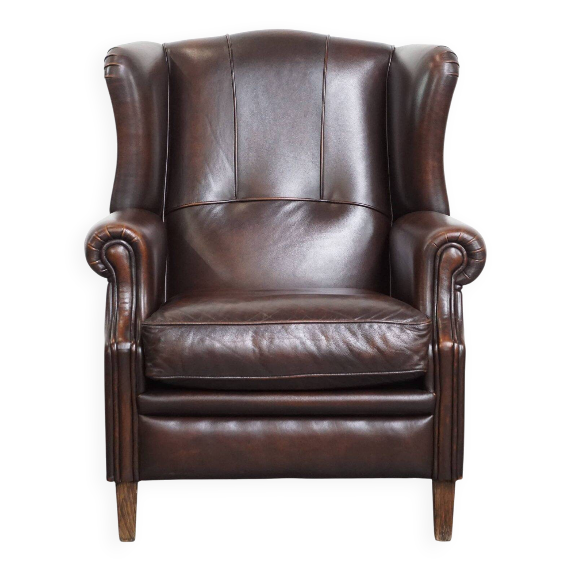 Very beautiful wing chair made of cowhide leather in English style