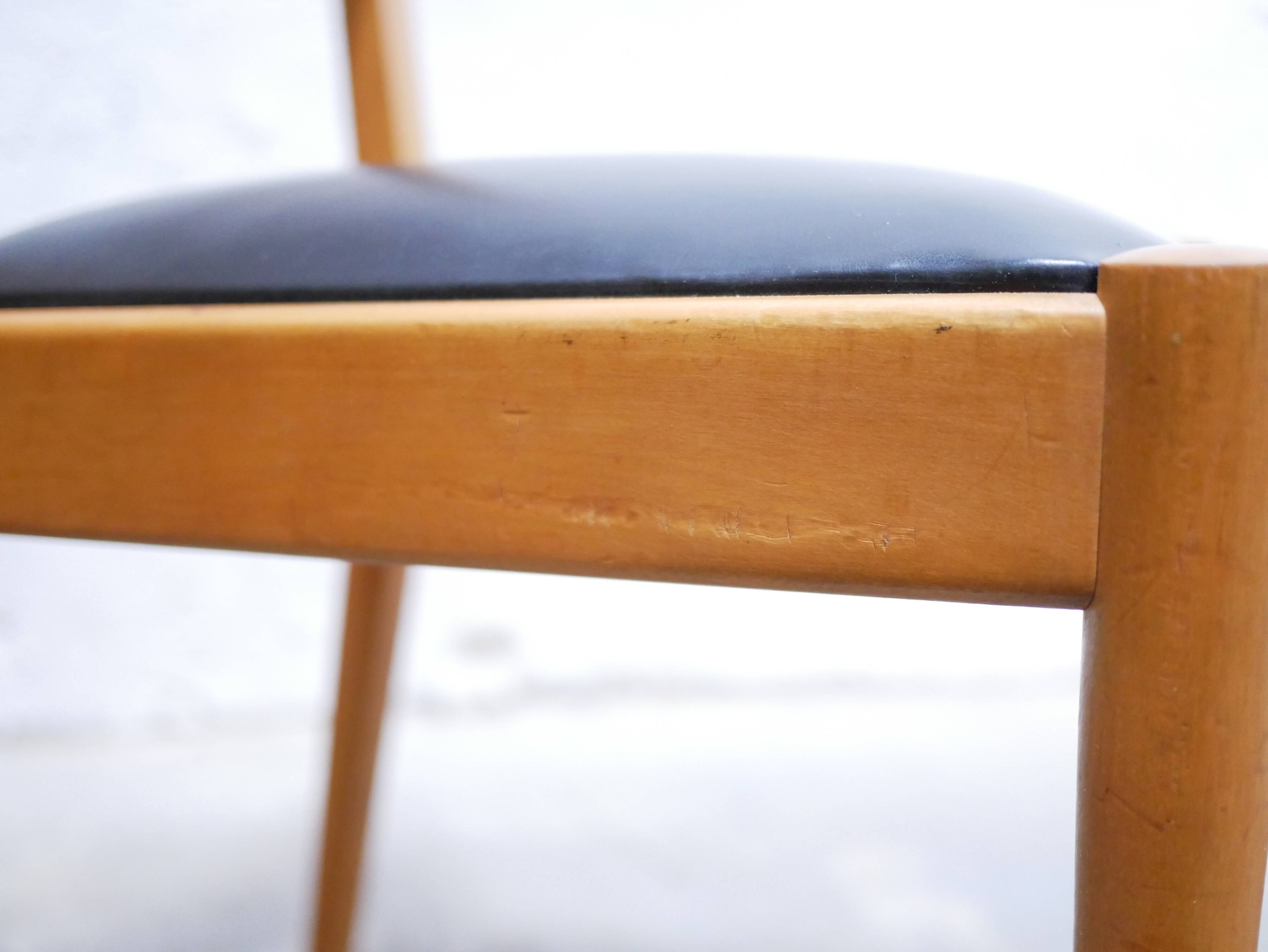 Series of 4 vintage chairs in wood and skaï