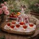 Vintage liqueur service in decorated red glass – decanter and 7 glasses