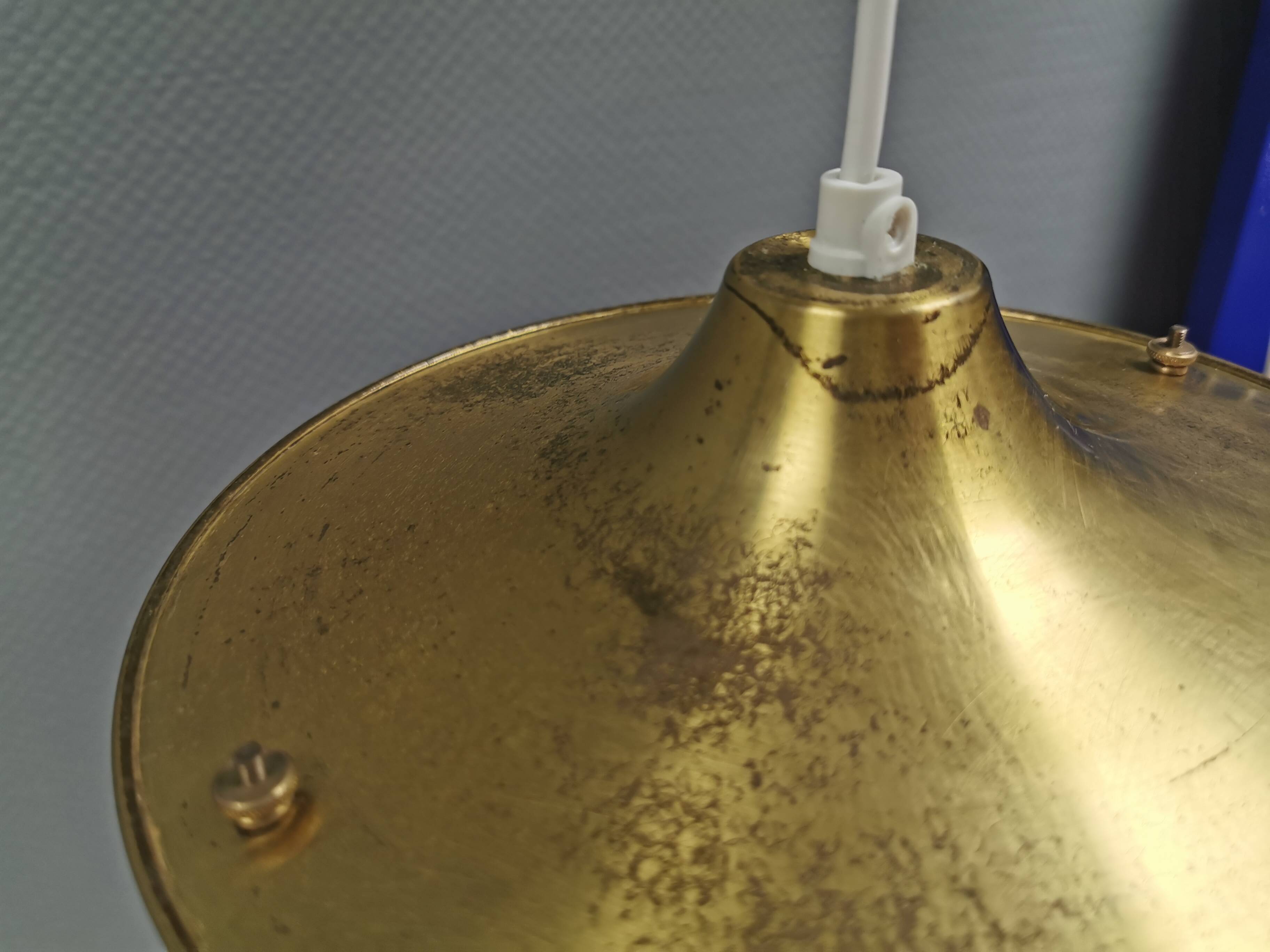 Beautiful older hanging lamp in brass and milky white glass. Germany 1950s