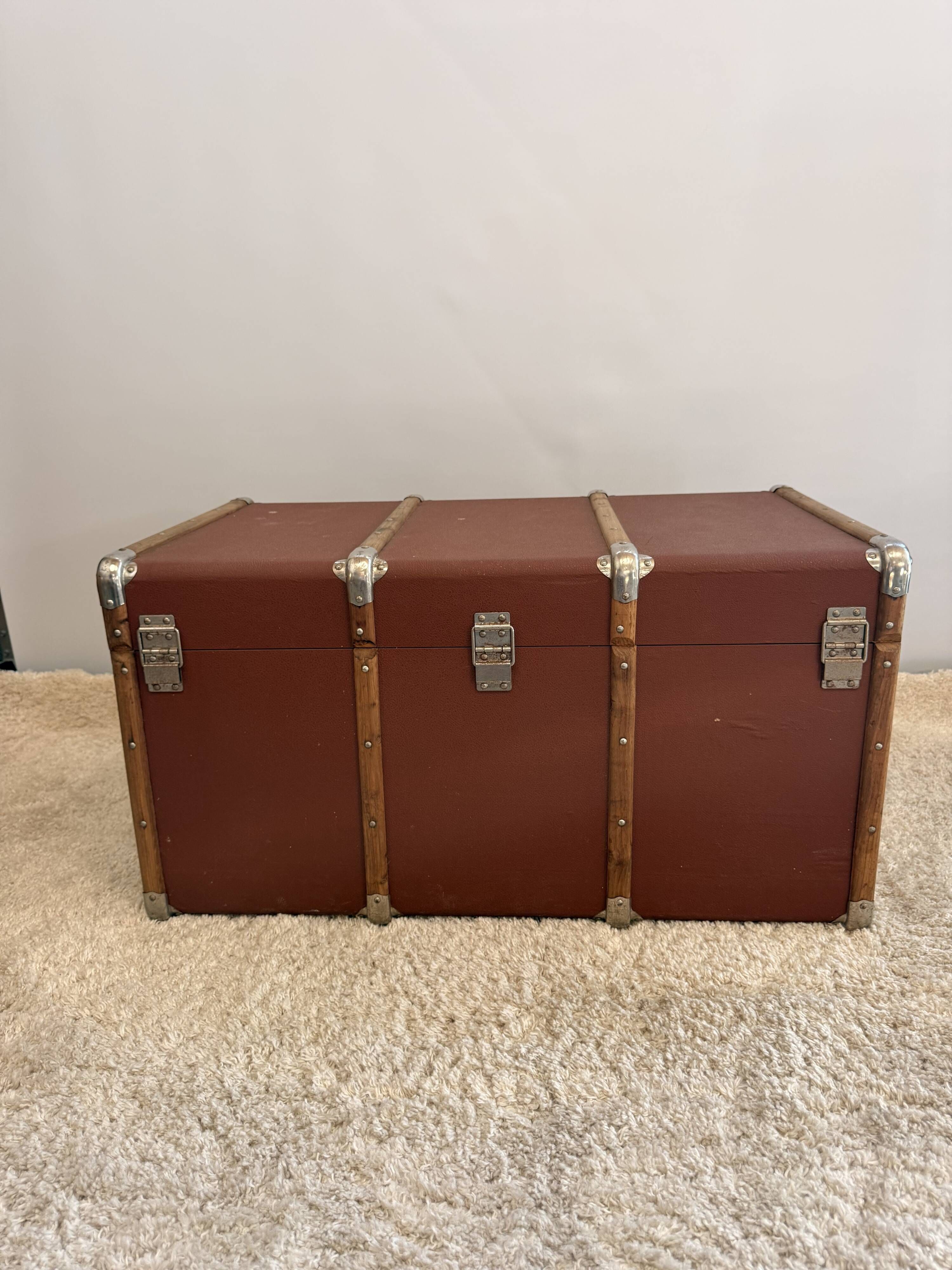 Vintage wooden and metal travel trunk