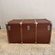 Vintage wooden and metal travel trunk